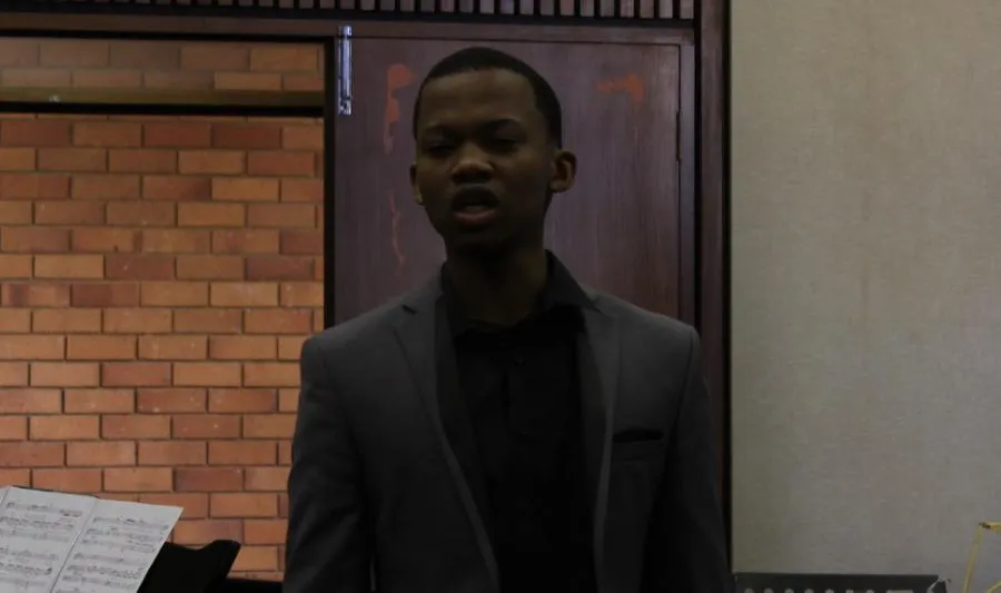 Student at grand piano