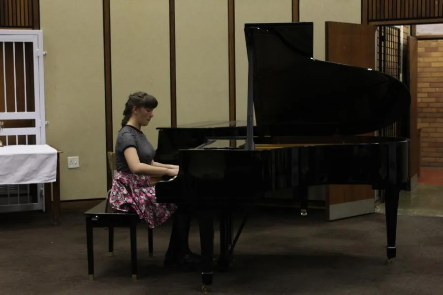 Piano student performing