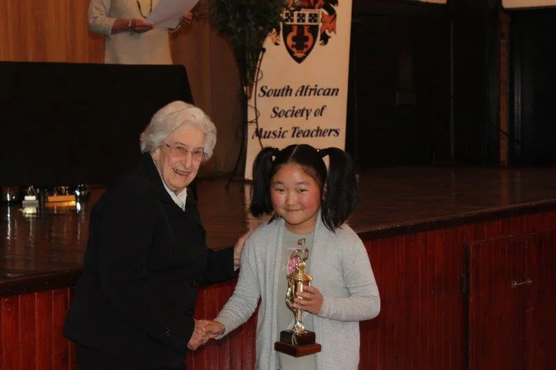 Award winner with trophy