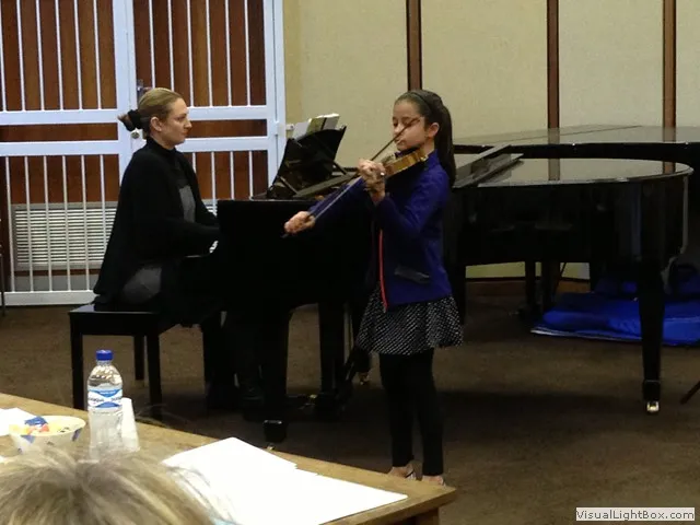 Young string player at festival