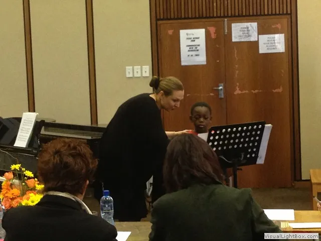 Young pianist at grand piano